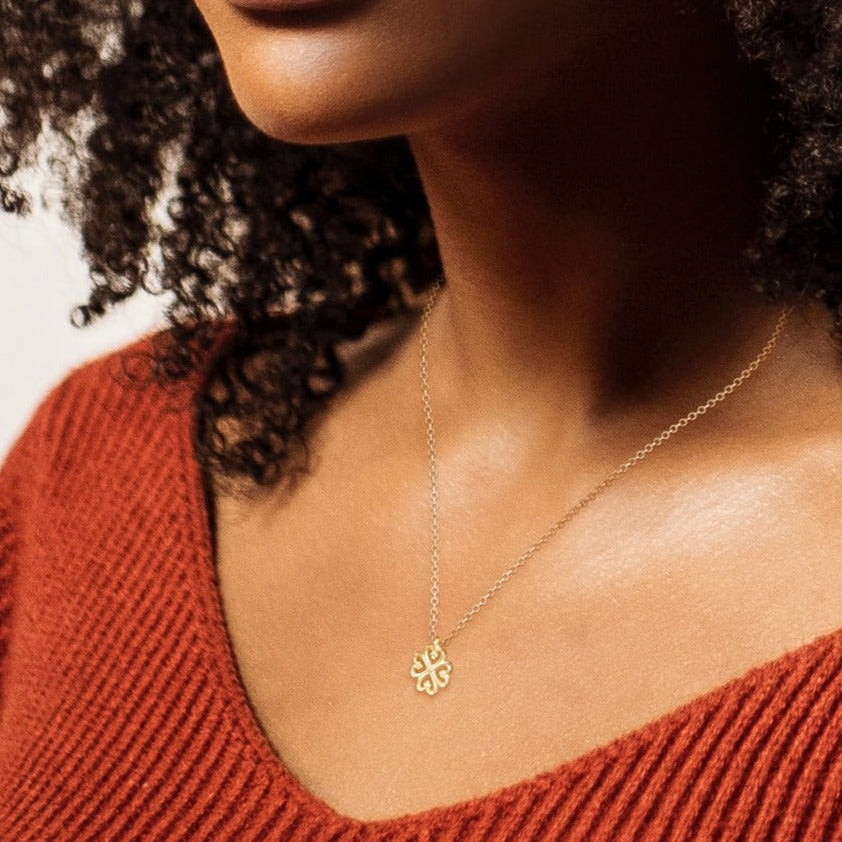 Adinkra Collection Nyame Dua Charm Necklace in polished 14ct yellow gold, 10mm pendant. Symbolizing God's presence and protection, with timeless elegance. Perfect alone or layered. Sold on a 16-inch chain.