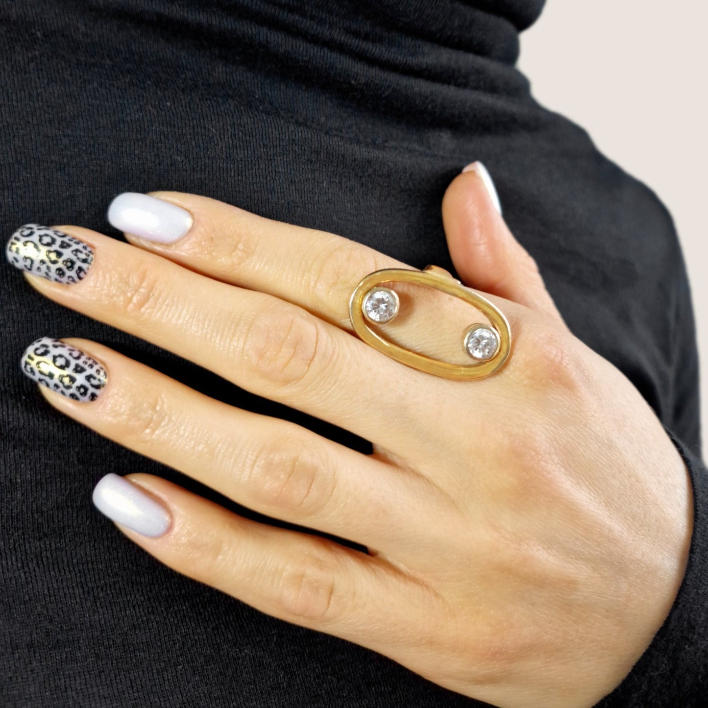 Legacy Collection
Martha Ring in 18ct yellow gold with 1.31ct VS/SI diamonds, 30mm length. Luxurious and impactful design, a tribute to a beloved family member. Available in various sizes and customisable with alternative gemstones.