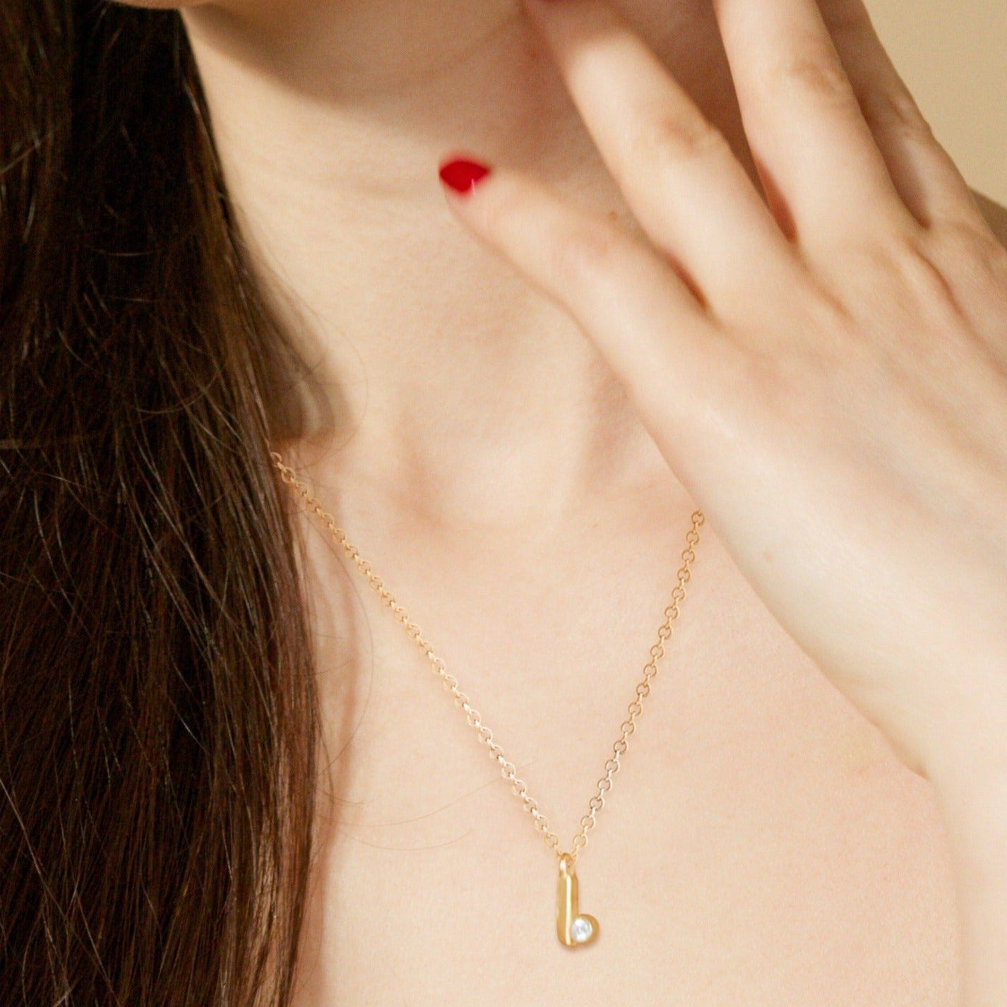 Legacy Collection Mini Sunni Pendant Necklace in 14ct yellow gold with 0.26ct SI1 diamond, 8mm pendant. A striking tribute, perfect for wearing alone or layered with favorites. Sold on a 16-inch chain, customizable with alternative gemstones