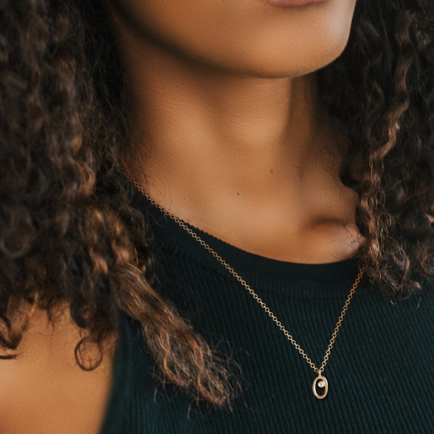 Legacy Collection Diana Mini Pendant Necklace in 14ct yellow gold with 0.16ct SI1 diamond, 8mm length. A heartfelt tribute, perfect alone or layered. Customizable with alternative gemstones. Sold on a 16-inch chain