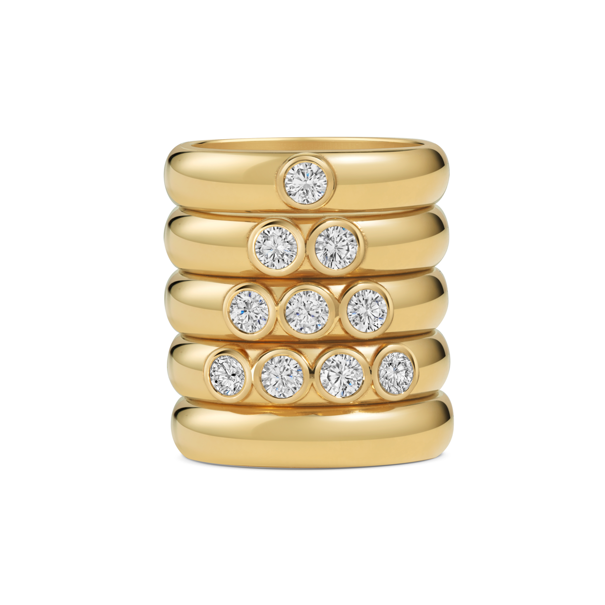 Seven Aunties Collection. Nia Stacking Rings, Seven Aunties Collection  - 9ct yellow gold, 0.10ct–0.41ct SI1 diamonds, 4.5mm band. Handcrafted in London.