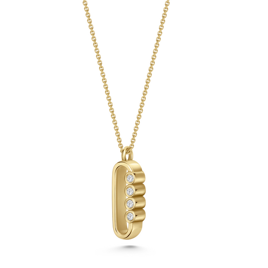 Legacy Collection Nina Pendant in polished 18ct yellow gold with 0.16ct VS/SI diamonds, 15mm length. A refined tribute to an icon, perfect for a subtle yet striking statement. Worn alone or layered. Sold on an 18-inch chain, customizable with alternative gemstones

